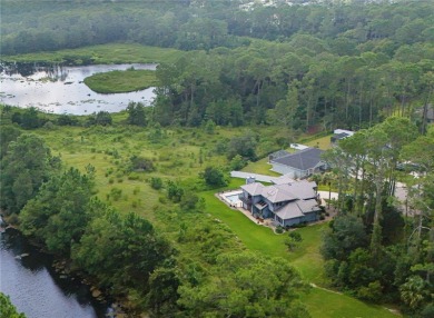 A rare find in Palm Coast, this 4-bedroom, 3-bath, 2,764 sq ft on Grand Club Matanzas in Florida - for sale on GolfHomes.com, golf home, golf lot