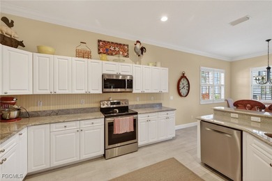 Enjoy peaceful lakefront living in this popular Heron model on Crown Colony Golf and Country Club in Florida - for sale on GolfHomes.com, golf home, golf lot