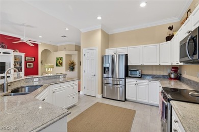 Enjoy peaceful lakefront living in this popular Heron model on Crown Colony Golf and Country Club in Florida - for sale on GolfHomes.com, golf home, golf lot