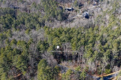 Located at the end of a quiet cul-de-sac, this 2.57-acre lot in on Natures Walk At Chinquapin in North Carolina - for sale on GolfHomes.com, golf home, golf lot