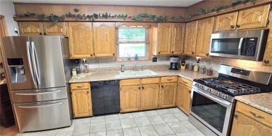 Impeccably Maintained Ranch on a  1/2 -Acre Lot and located on Baxter Country Club in Kansas - for sale on GolfHomes.com, golf home, golf lot