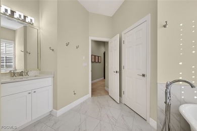 Enjoy peaceful lakefront living in this popular Heron model on Crown Colony Golf and Country Club in Florida - for sale on GolfHomes.com, golf home, golf lot