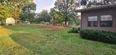 Impeccably Maintained Ranch on a  1/2 -Acre Lot and located on Baxter Country Club in Kansas - for sale on GolfHomes.com, golf home, golf lot