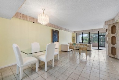 Welcome home to this beautifully maintained first-floor condo on The Country Club At Boca Raton in Florida - for sale on GolfHomes.com, golf home, golf lot