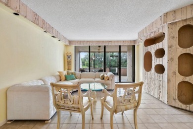 Welcome home to this beautifully maintained first-floor condo on The Country Club At Boca Raton in Florida - for sale on GolfHomes.com, golf home, golf lot