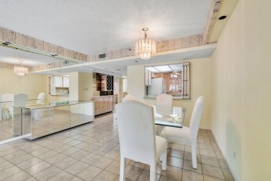 Welcome home to this beautifully maintained first-floor condo on The Country Club At Boca Raton in Florida - for sale on GolfHomes.com, golf home, golf lot
