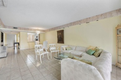 Welcome home to this beautifully maintained first-floor condo on The Country Club At Boca Raton in Florida - for sale on GolfHomes.com, golf home, golf lot