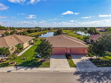 This spacious twin villa showcases breathtaking views of two on Herons Glen Golf and Country Club in Florida - for sale on GolfHomes.com, golf home, golf lot