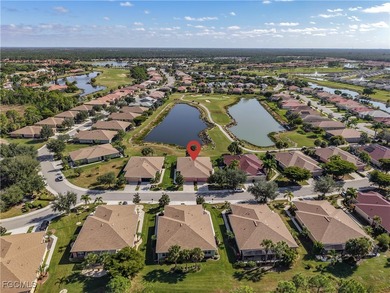 This spacious twin villa showcases breathtaking views of two on Herons Glen Golf and Country Club in Florida - for sale on GolfHomes.com, golf home, golf lot
