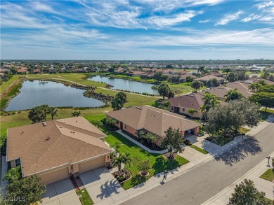 This spacious twin villa showcases breathtaking views of two on Herons Glen Golf and Country Club in Florida - for sale on GolfHomes.com, golf home, golf lot