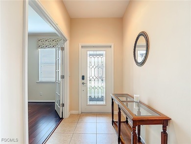 This spacious twin villa showcases breathtaking views of two on Herons Glen Golf and Country Club in Florida - for sale on GolfHomes.com, golf home, golf lot