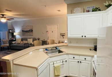 Quiet, private, and specious 1st floor & end-unit condo in a on Windsor Parke Golf Club in Florida - for sale on GolfHomes.com, golf home, golf lot