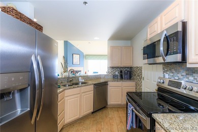 Enjoy panoramic lake views & resort-style living in this on Bear Creek Valley Golf Club in Missouri - for sale on GolfHomes.com, golf home, golf lot