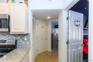 Enjoy panoramic lake views & resort-style living in this on Bear Creek Valley Golf Club in Missouri - for sale on GolfHomes.com, golf home, golf lot