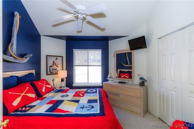 Enjoy panoramic lake views & resort-style living in this on Bear Creek Valley Golf Club in Missouri - for sale on GolfHomes.com, golf home, golf lot