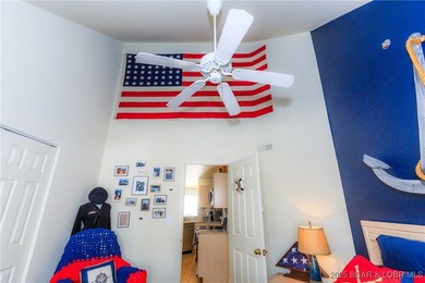 Enjoy panoramic lake views & resort-style living in this on Bear Creek Valley Golf Club in Missouri - for sale on GolfHomes.com, golf home, golf lot