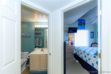 Enjoy panoramic lake views & resort-style living in this on Bear Creek Valley Golf Club in Missouri - for sale on GolfHomes.com, golf home, golf lot