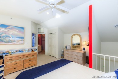 Enjoy panoramic lake views & resort-style living in this on Bear Creek Valley Golf Club in Missouri - for sale on GolfHomes.com, golf home, golf lot