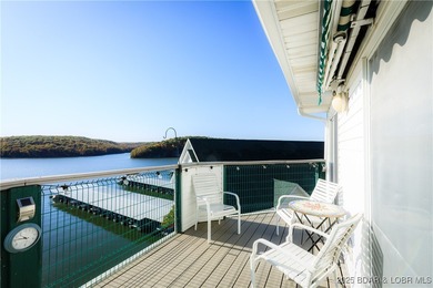 Enjoy panoramic lake views & resort-style living in this on Bear Creek Valley Golf Club in Missouri - for sale on GolfHomes.com, golf home, golf lot