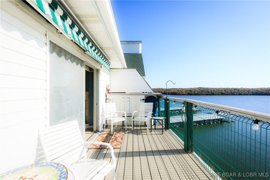 Enjoy panoramic lake views & resort-style living in this on Bear Creek Valley Golf Club in Missouri - for sale on GolfHomes.com, golf home, golf lot