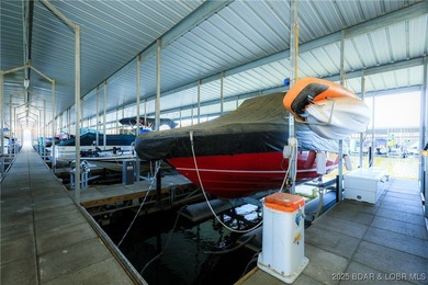 Enjoy panoramic lake views & resort-style living in this on Bear Creek Valley Golf Club in Missouri - for sale on GolfHomes.com, golf home, golf lot