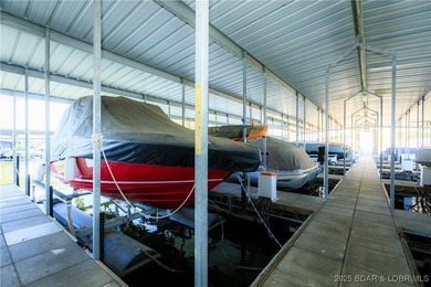 Enjoy panoramic lake views & resort-style living in this on Bear Creek Valley Golf Club in Missouri - for sale on GolfHomes.com, golf home, golf lot