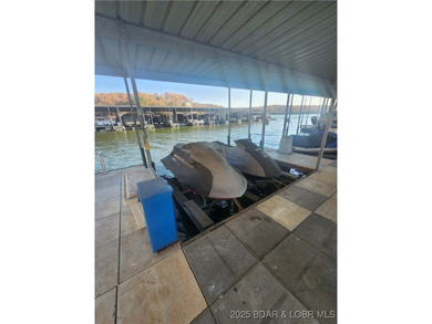 Enjoy panoramic lake views & resort-style living in this on Bear Creek Valley Golf Club in Missouri - for sale on GolfHomes.com, golf home, golf lot