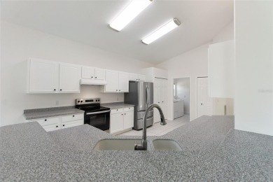 One or more photo(s) has been virtually staged. RidgeDale 3/2 on Ridgewood Lakes Golf and Country Club in Florida - for sale on GolfHomes.com, golf home, golf lot