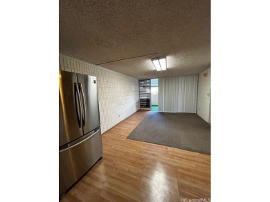 This centrally located unit features three bedrooms, two on Honolulu Country Club in Hawaii - for sale on GolfHomes.com, golf home, golf lot