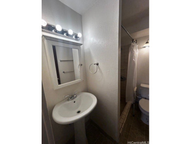 This centrally located unit features three bedrooms, two on Honolulu Country Club in Hawaii - for sale on GolfHomes.com, golf home, golf lot