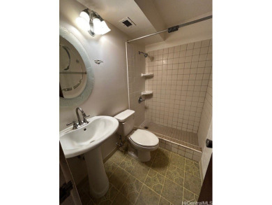 This centrally located unit features three bedrooms, two on Honolulu Country Club in Hawaii - for sale on GolfHomes.com, golf home, golf lot