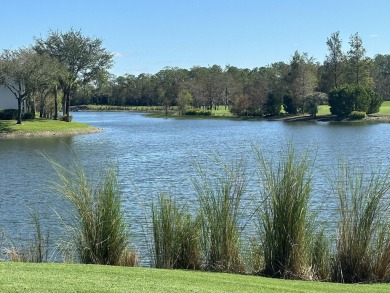 Panoramic West facing lake and fairway views abound in this on Cedar Hammock Golf and Country Club in Florida - for sale on GolfHomes.com, golf home, golf lot