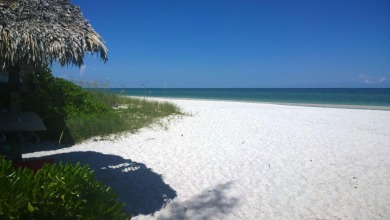 Panoramic West facing lake and fairway views abound in this on Cedar Hammock Golf and Country Club in Florida - for sale on GolfHomes.com, golf home, golf lot