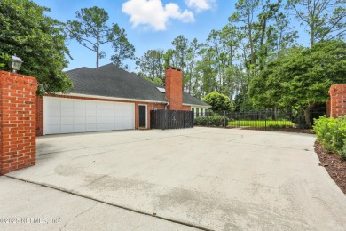 Welcome to your Georgian dream home nestled on a quiet on The Deerwood Country Club in Florida - for sale on GolfHomes.com, golf home, golf lot
