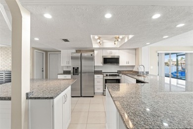 This beautifully updated Gulf Harbors waterfront home delivers on Gulf Harbors Golf Course in Florida - for sale on GolfHomes.com, golf home, golf lot