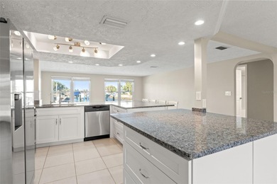 This beautifully updated Gulf Harbors waterfront home delivers on Gulf Harbors Golf Course in Florida - for sale on GolfHomes.com, golf home, golf lot