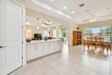 Absolutely stunning three-bedroom, two-bath, PLUS OFFICE on Apollo Beach Golf and Sea Club in Florida - for sale on GolfHomes.com, golf home, golf lot