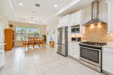 Absolutely stunning three-bedroom, two-bath, PLUS OFFICE on Apollo Beach Golf and Sea Club in Florida - for sale on GolfHomes.com, golf home, golf lot