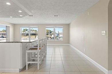 This beautifully updated Gulf Harbors waterfront home delivers on Gulf Harbors Golf Course in Florida - for sale on GolfHomes.com, golf home, golf lot