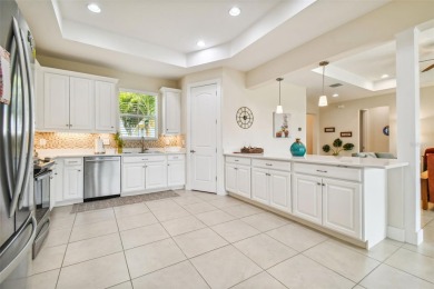 Absolutely stunning three-bedroom, two-bath, PLUS OFFICE on Apollo Beach Golf and Sea Club in Florida - for sale on GolfHomes.com, golf home, golf lot