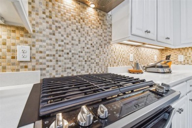 Absolutely stunning three-bedroom, two-bath, PLUS OFFICE on Apollo Beach Golf and Sea Club in Florida - for sale on GolfHomes.com, golf home, golf lot