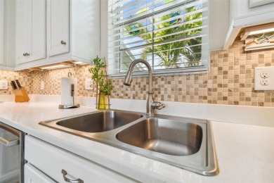 Absolutely stunning three-bedroom, two-bath, PLUS OFFICE on Apollo Beach Golf and Sea Club in Florida - for sale on GolfHomes.com, golf home, golf lot