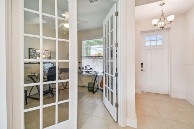 Absolutely stunning three-bedroom, two-bath, PLUS OFFICE on Apollo Beach Golf and Sea Club in Florida - for sale on GolfHomes.com, golf home, golf lot