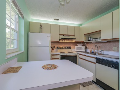 his turnkey 2 bedroom/2 bath condo has impact windows except for on The American Golf Club in Florida - for sale on GolfHomes.com, golf home, golf lot