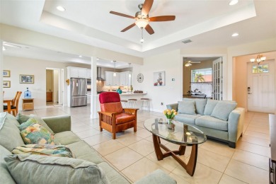 Absolutely stunning three-bedroom, two-bath, PLUS OFFICE on Apollo Beach Golf and Sea Club in Florida - for sale on GolfHomes.com, golf home, golf lot