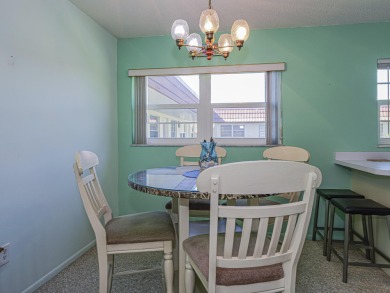 his turnkey 2 bedroom/2 bath condo has impact windows except for on The American Golf Club in Florida - for sale on GolfHomes.com, golf home, golf lot