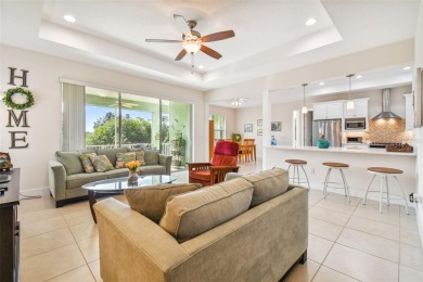 Absolutely stunning three-bedroom, two-bath, PLUS OFFICE on Apollo Beach Golf and Sea Club in Florida - for sale on GolfHomes.com, golf home, golf lot