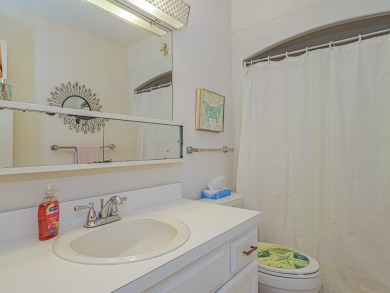 his turnkey 2 bedroom/2 bath condo has impact windows except for on The American Golf Club in Florida - for sale on GolfHomes.com, golf home, golf lot