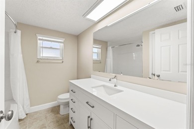 This beautifully updated Gulf Harbors waterfront home delivers on Gulf Harbors Golf Course in Florida - for sale on GolfHomes.com, golf home, golf lot