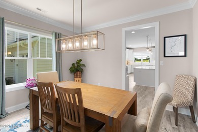 This beautiful 3-bedroom, 2.5-bath custom-built home with two on North River Club in North Carolina - for sale on GolfHomes.com, golf home, golf lot